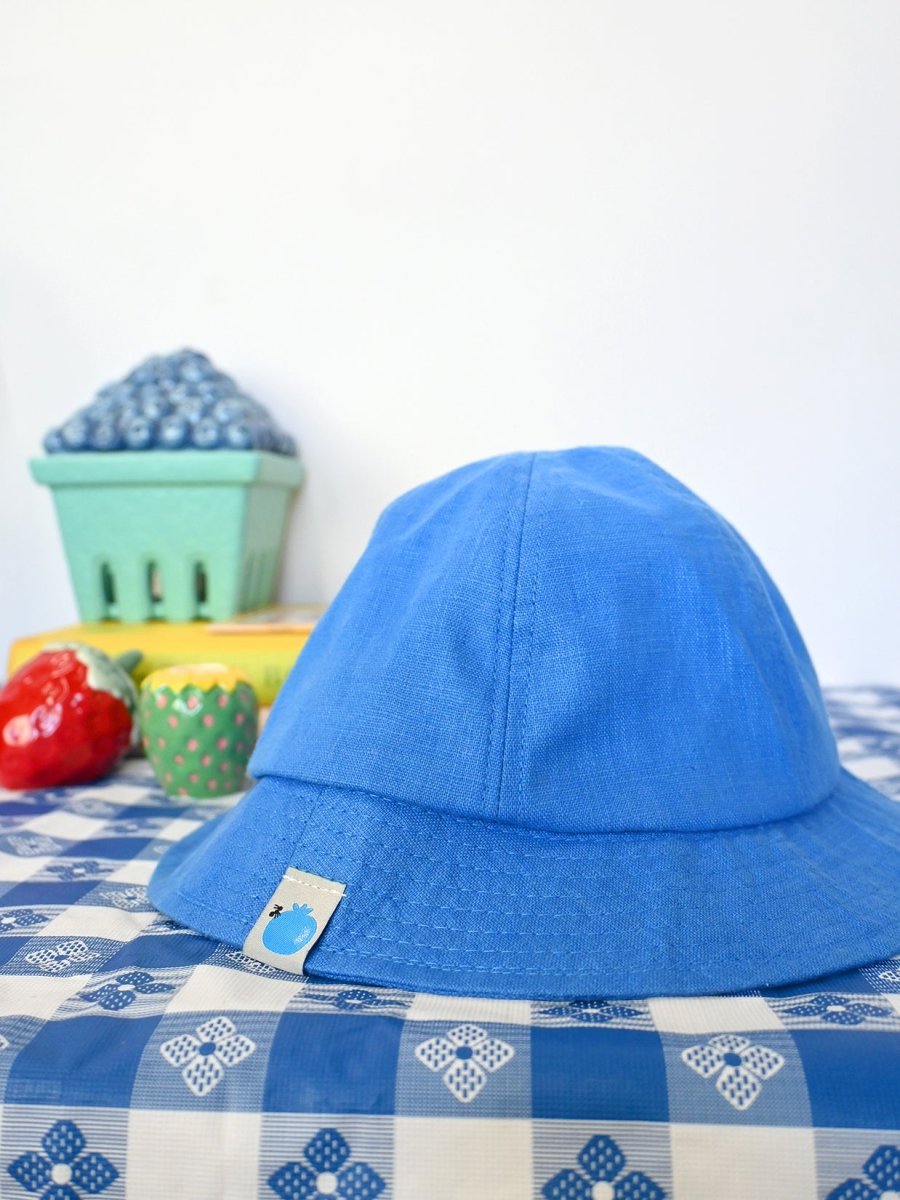 "Blueberry & Ant" Linen bucket hat. Designed by HO HOS HOLE IN THE WALL brand. Made in NYC.